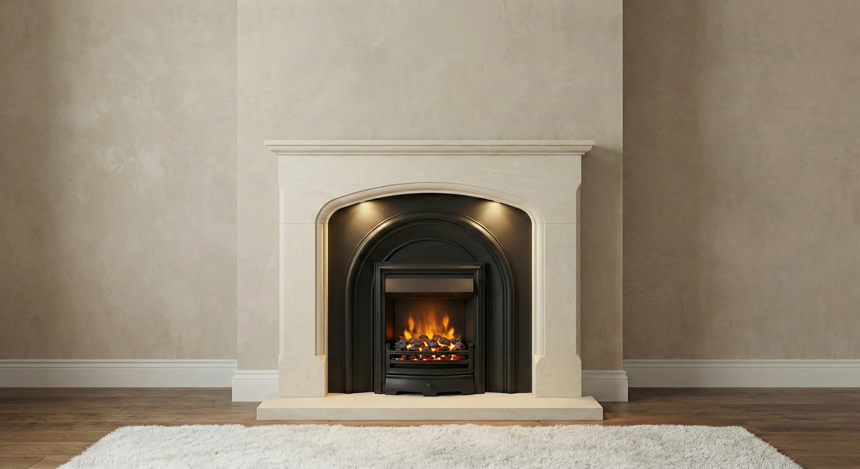 Fireplace with a lit fire in a room with beige walls and wooden floor.